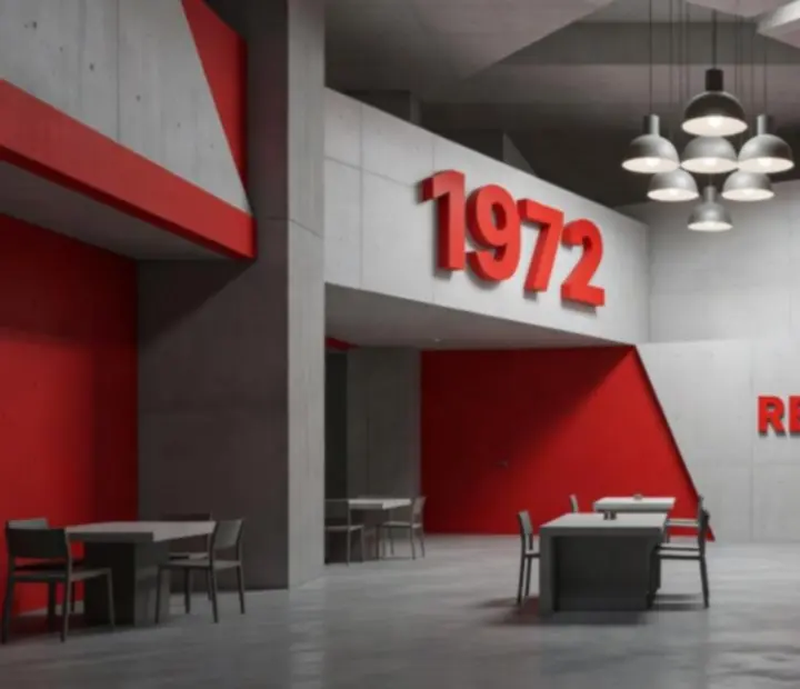Brutalistní interiér restaurace Bohemiva s betonem, červenými akcenty a pokerovými stoly